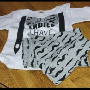 A onesie pants and hat set
